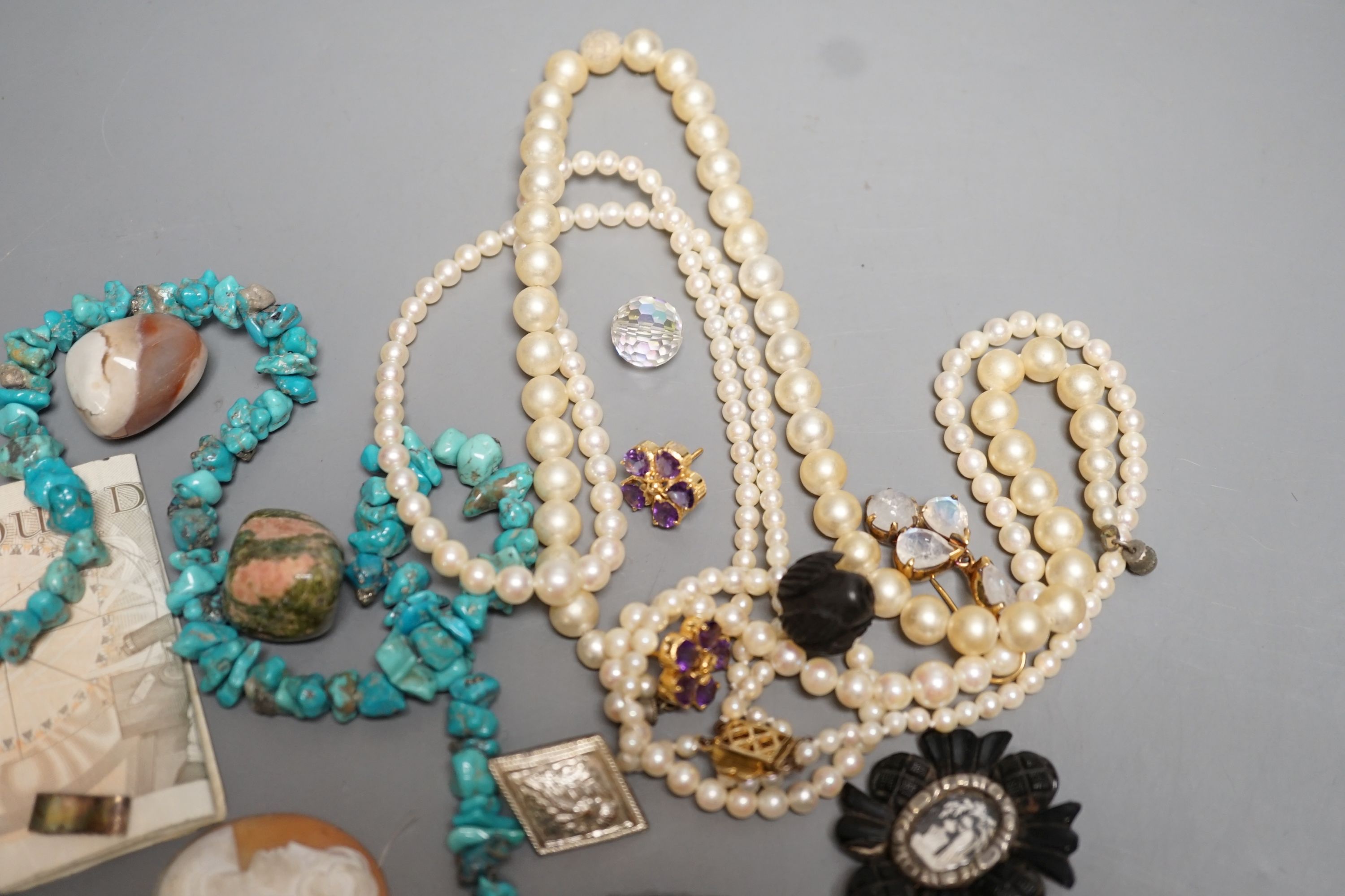 A quantity of costume jewellery including a pair of yellow metal and opal drop earrings.